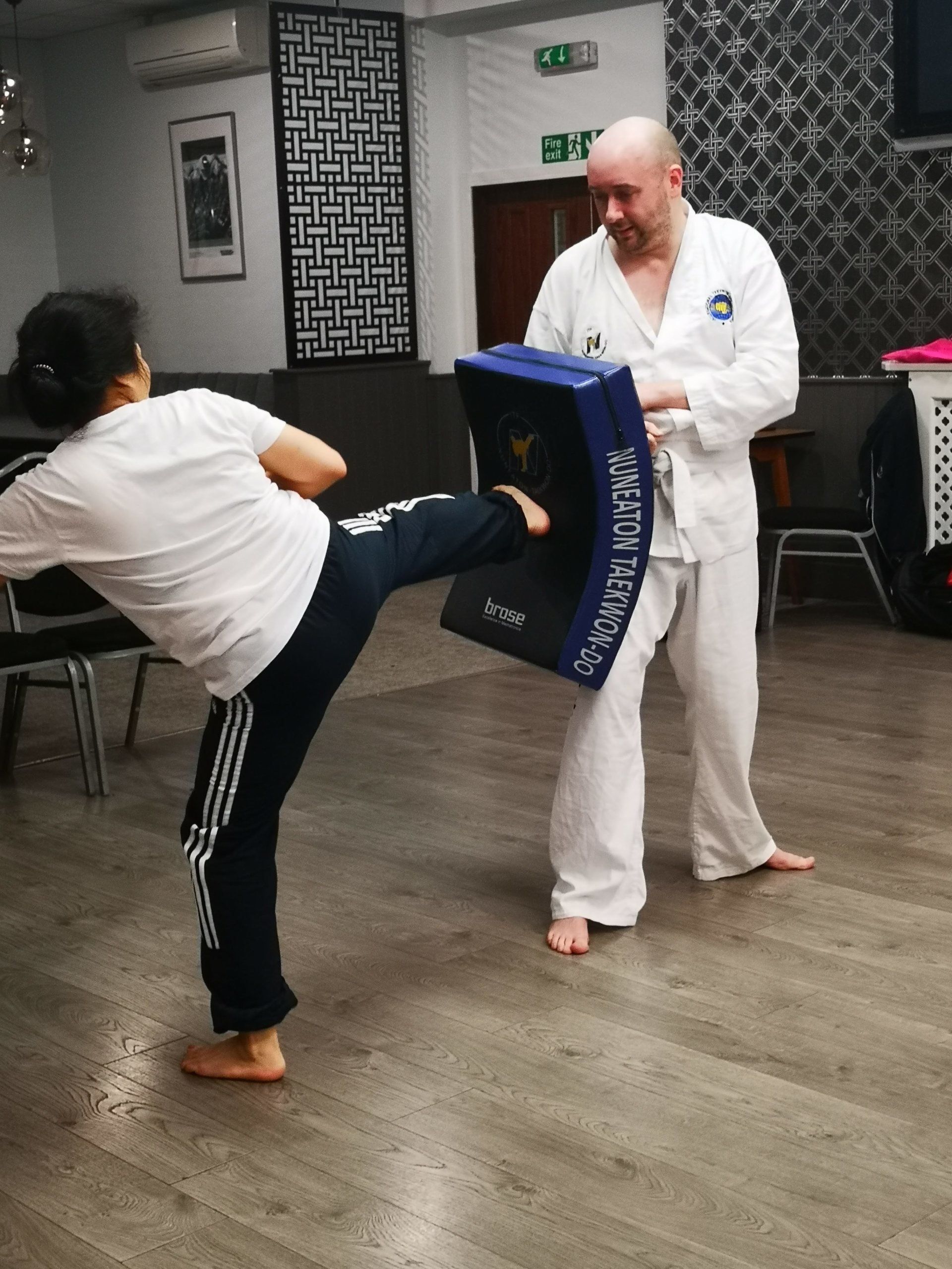 Lady kicking kickshield