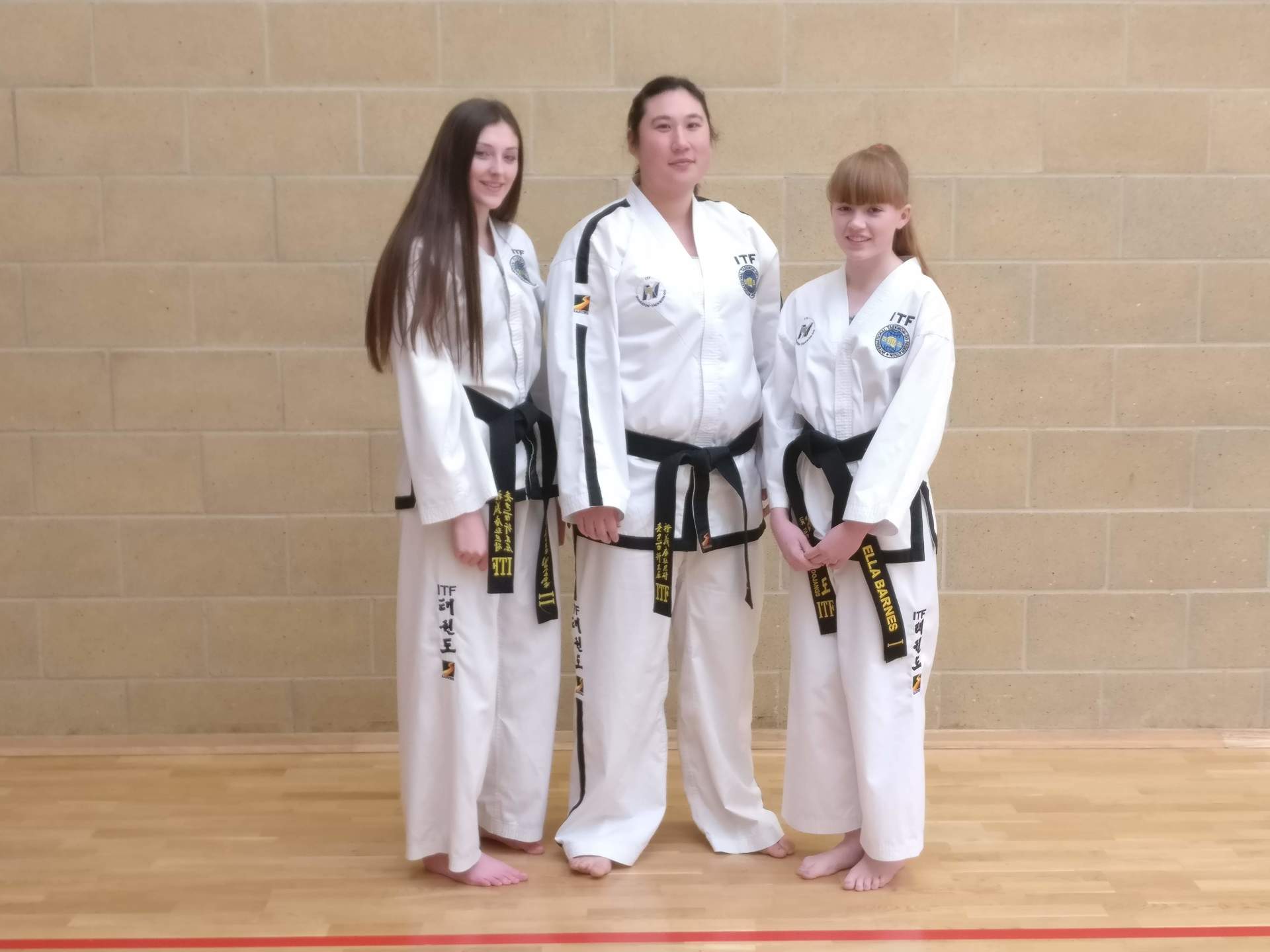 Nuneaton Taekwondo instructor Danielle Williams and students Bethany Frisby and Ella Barnes