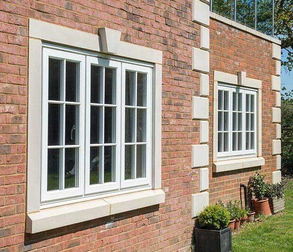 closed bi-fold windows overlooking snow