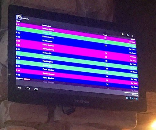 A dell monitor displays a list of songs