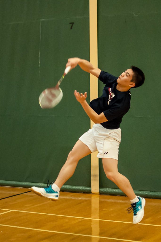 boy playing badminton