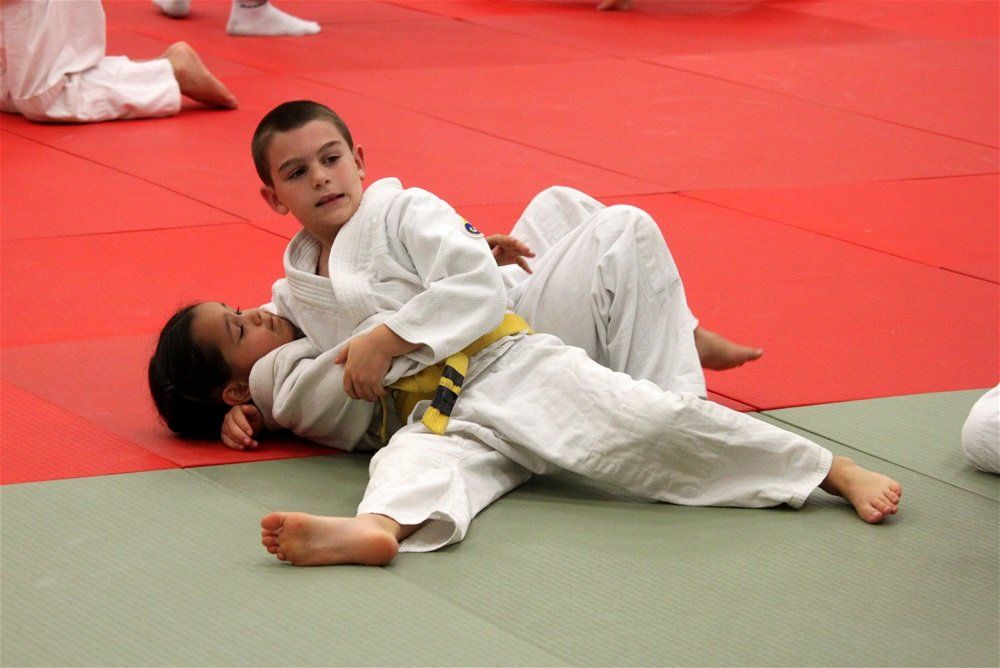 young boys in a judo match