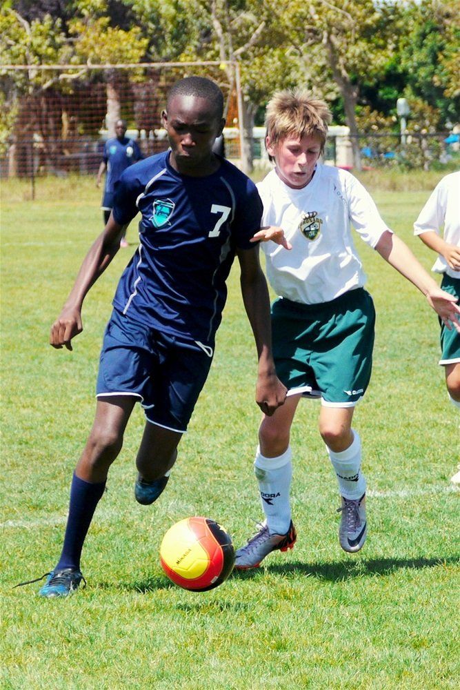 boys playing soccer