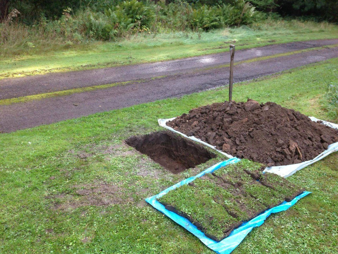 Trenchless moling on a grassed area