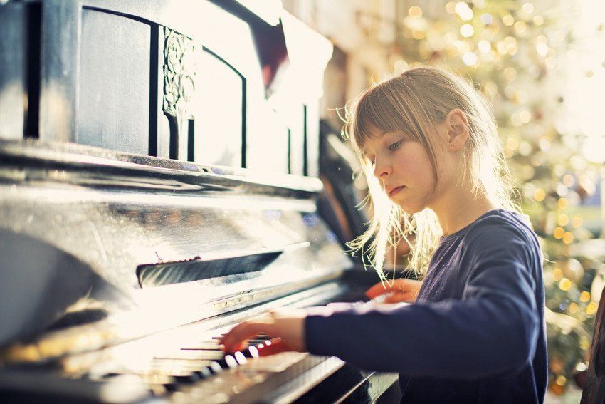 a lady playing piano