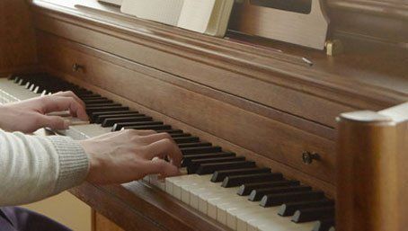 JB Clare playing piano