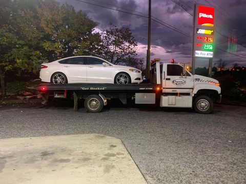 Tow truck tow a white car — Pigeon Forge, TN — Carr's Auto Service Tow truck tow a white car — Pigeon Forge, TN — Carr's Auto Service
