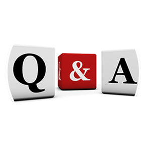 a red cube with the letters q and a on it