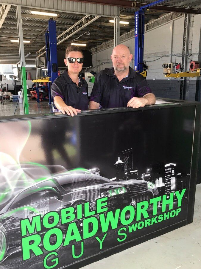 Two Man In Front of Shop — Mobile Roadworthy Guys Townsville in Aitkenvale, QLD