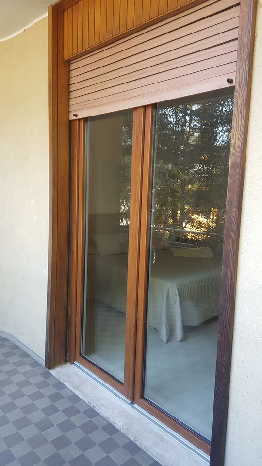 porta-finestra in legno per accesso alla terrazza