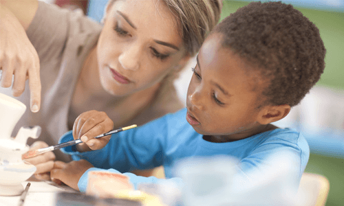A boy painting