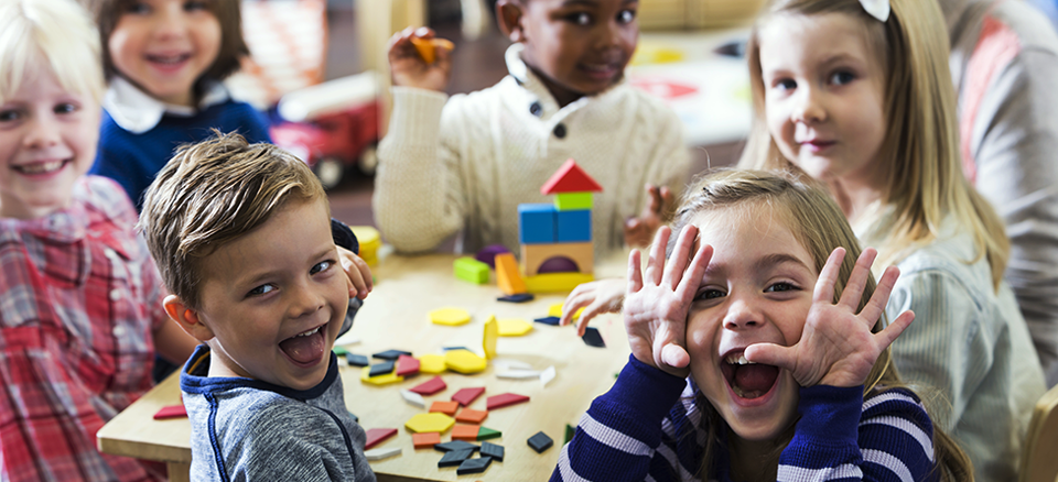kids playing in a classroom