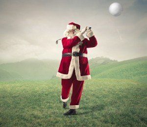 Santa playing golf