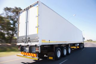 Moving Trailer — Semi Truck on Curve Road in Fort Collins, CO