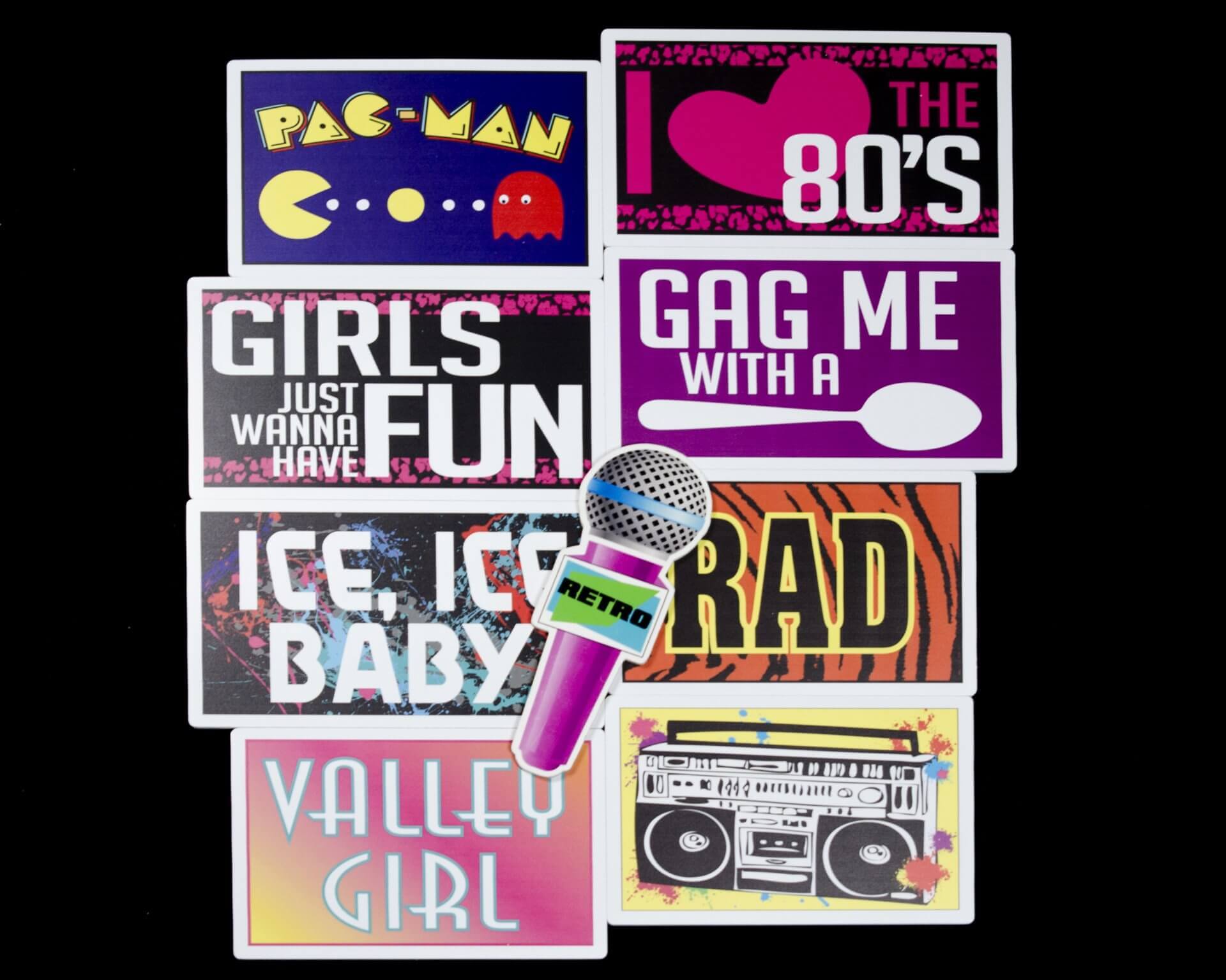 Collection of retro-themed stickers featuring Pac-Man, phrases, and 80s pop culture icons.
