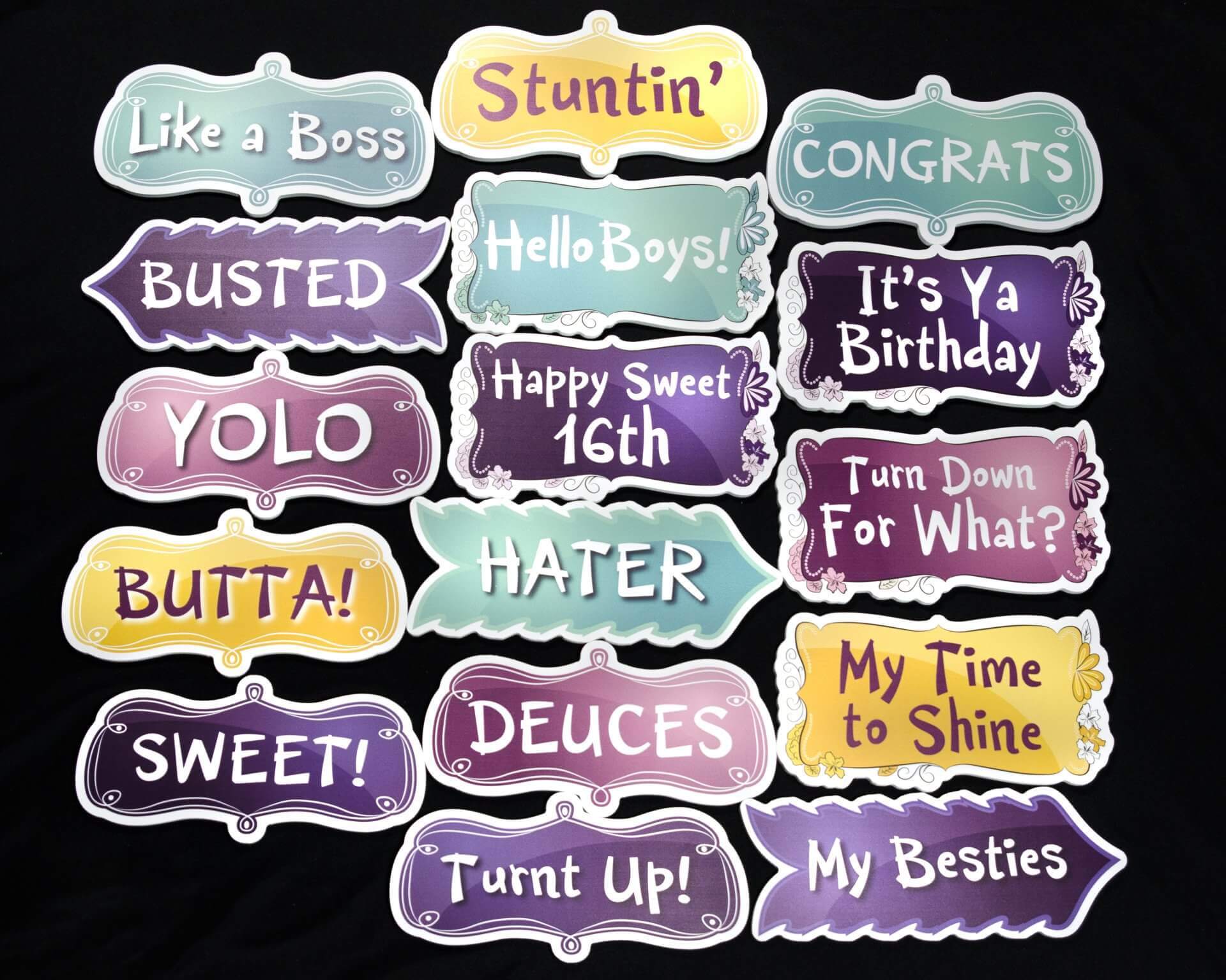 Photo booth props with phrases like 