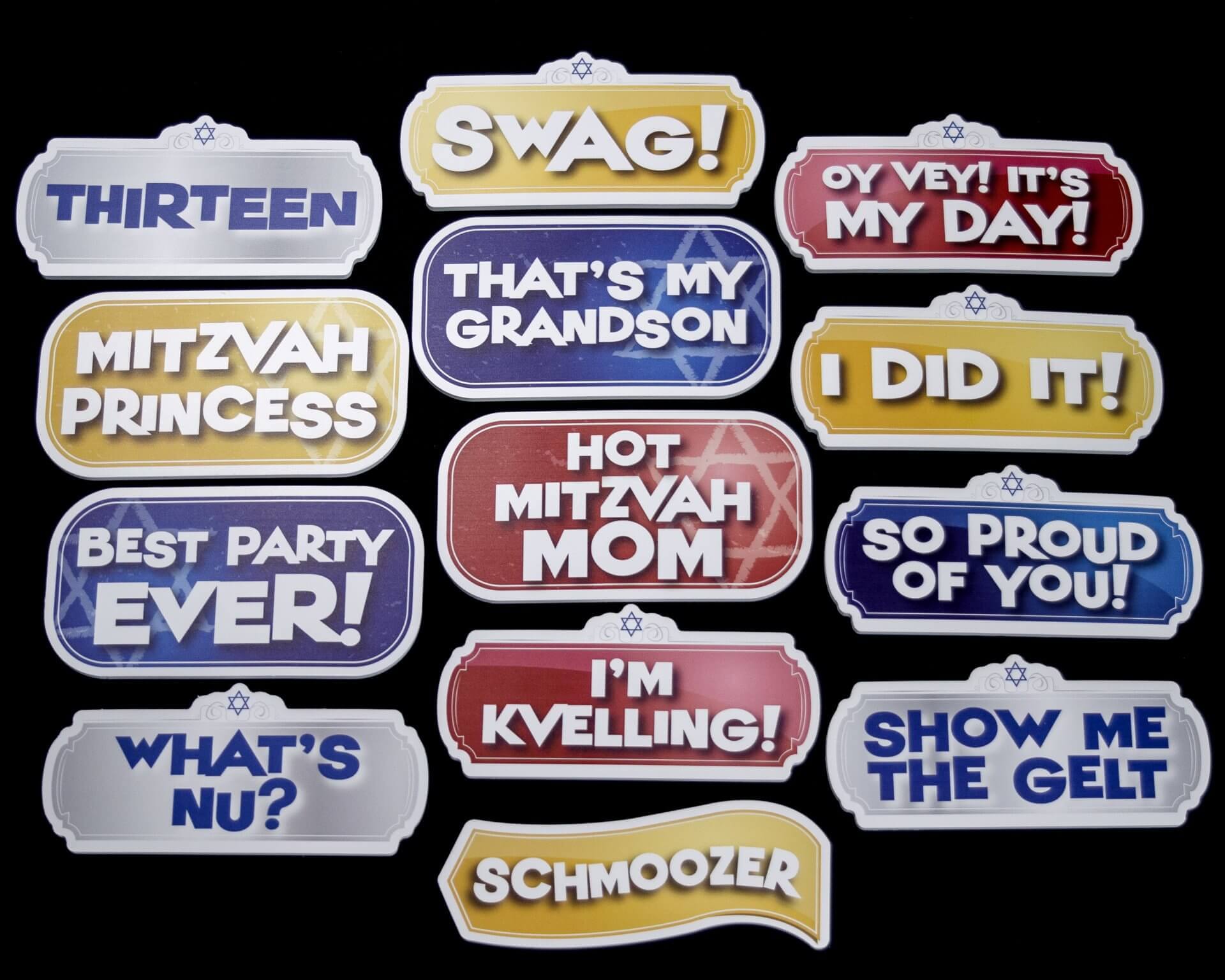 Photo booth props with Jewish celebratory phrases like 