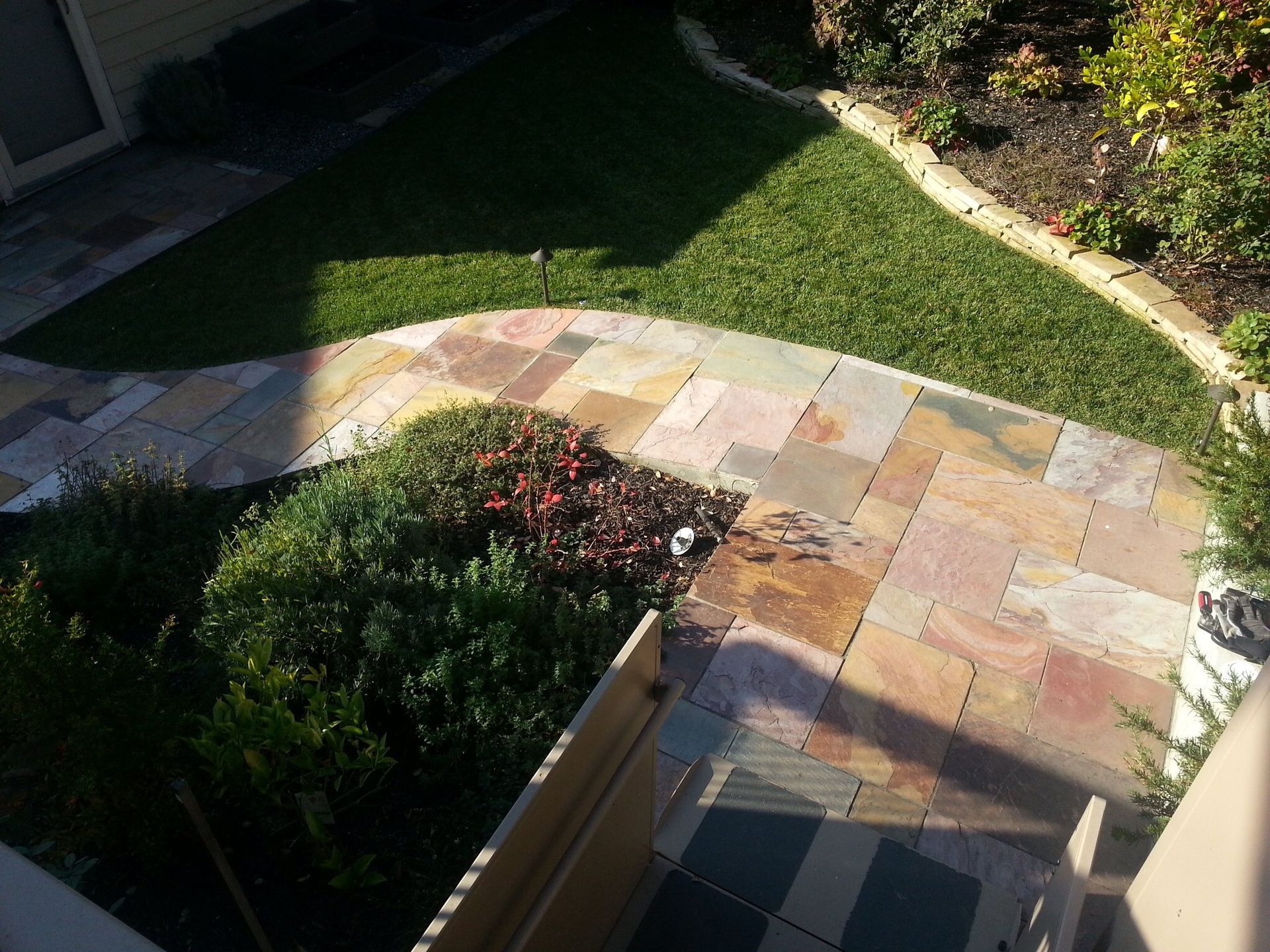 Natural stone walkway in backyard