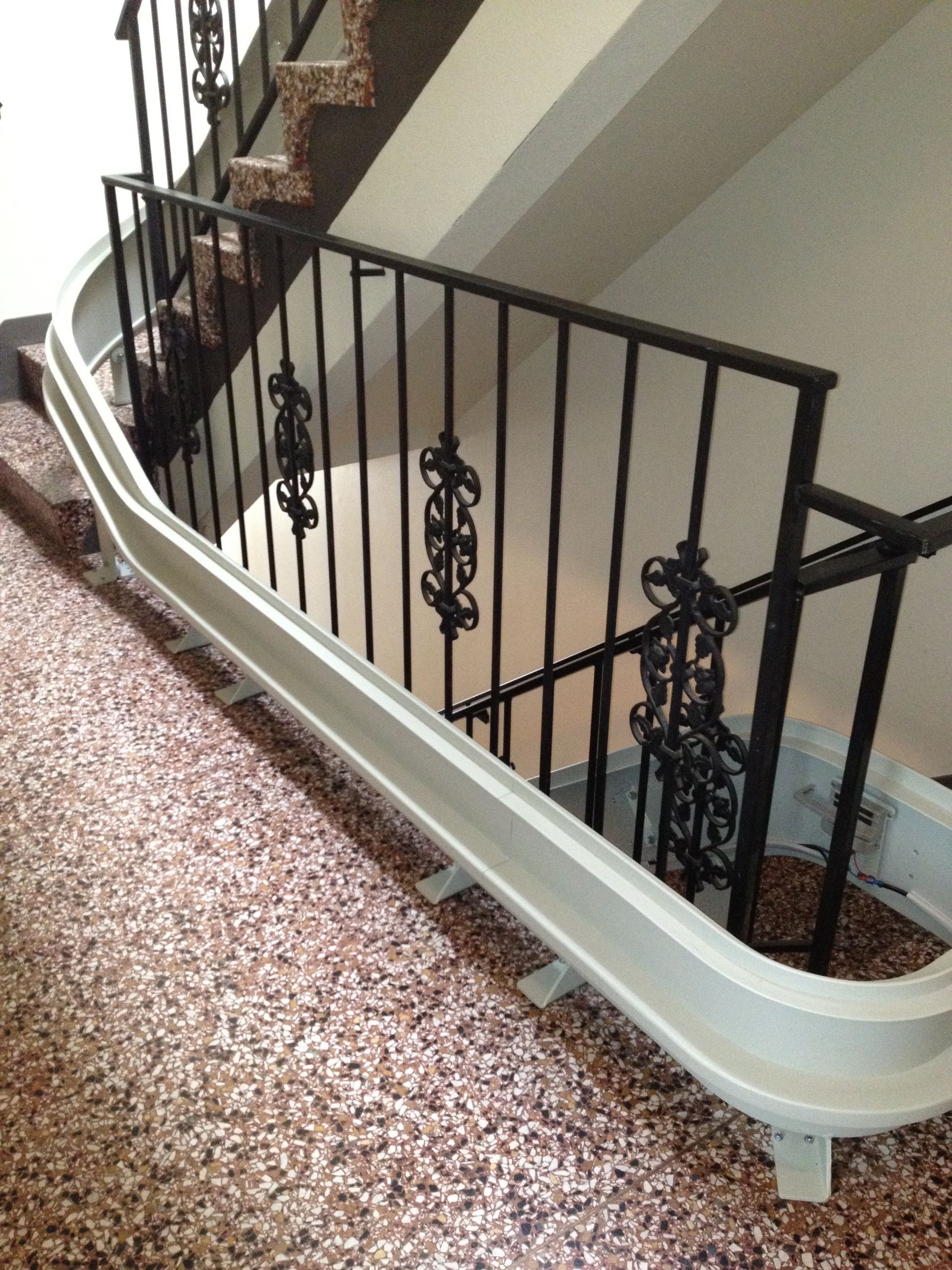 Stair Lift Track Bordering Railing