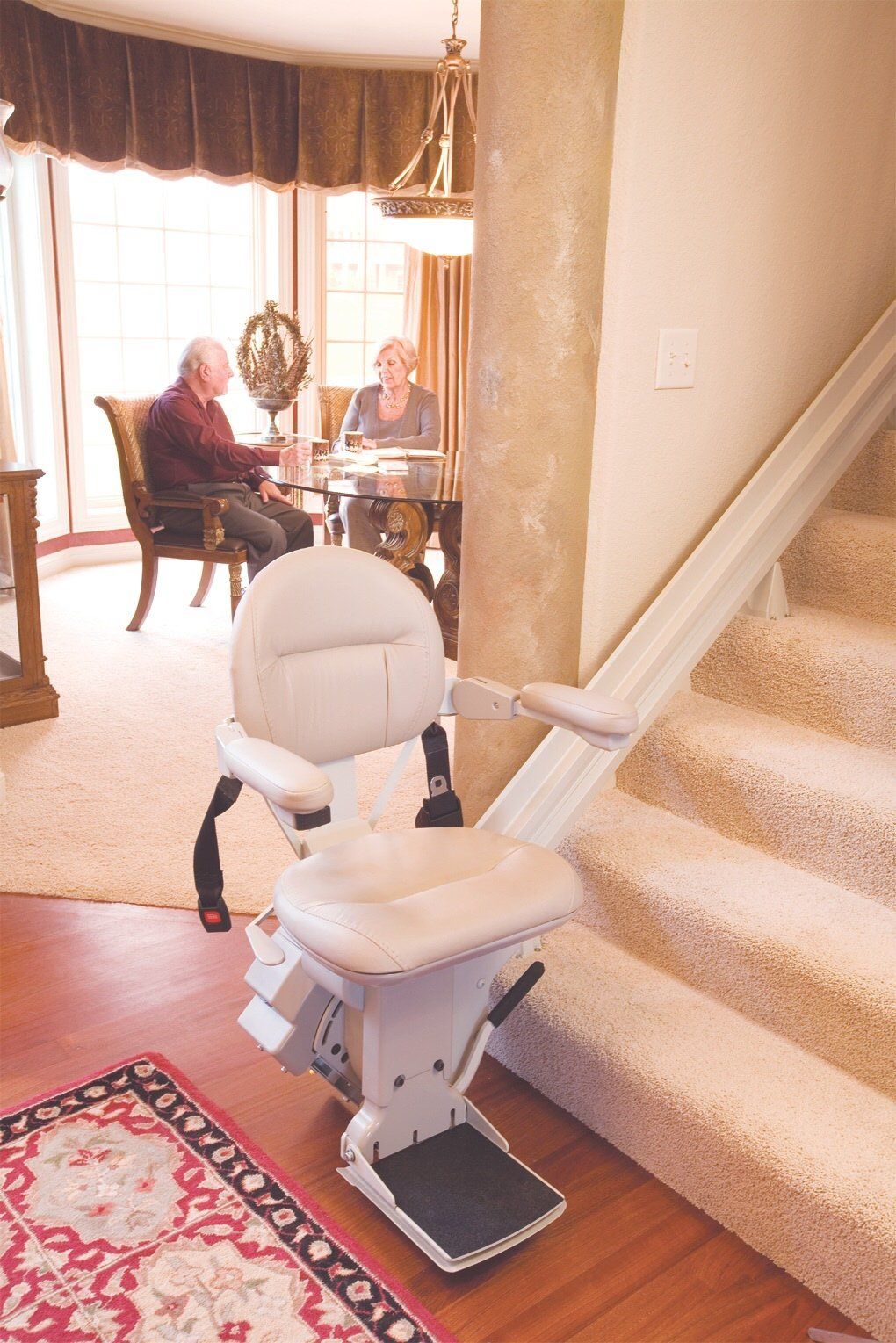 Stair lift at bottom of stairs