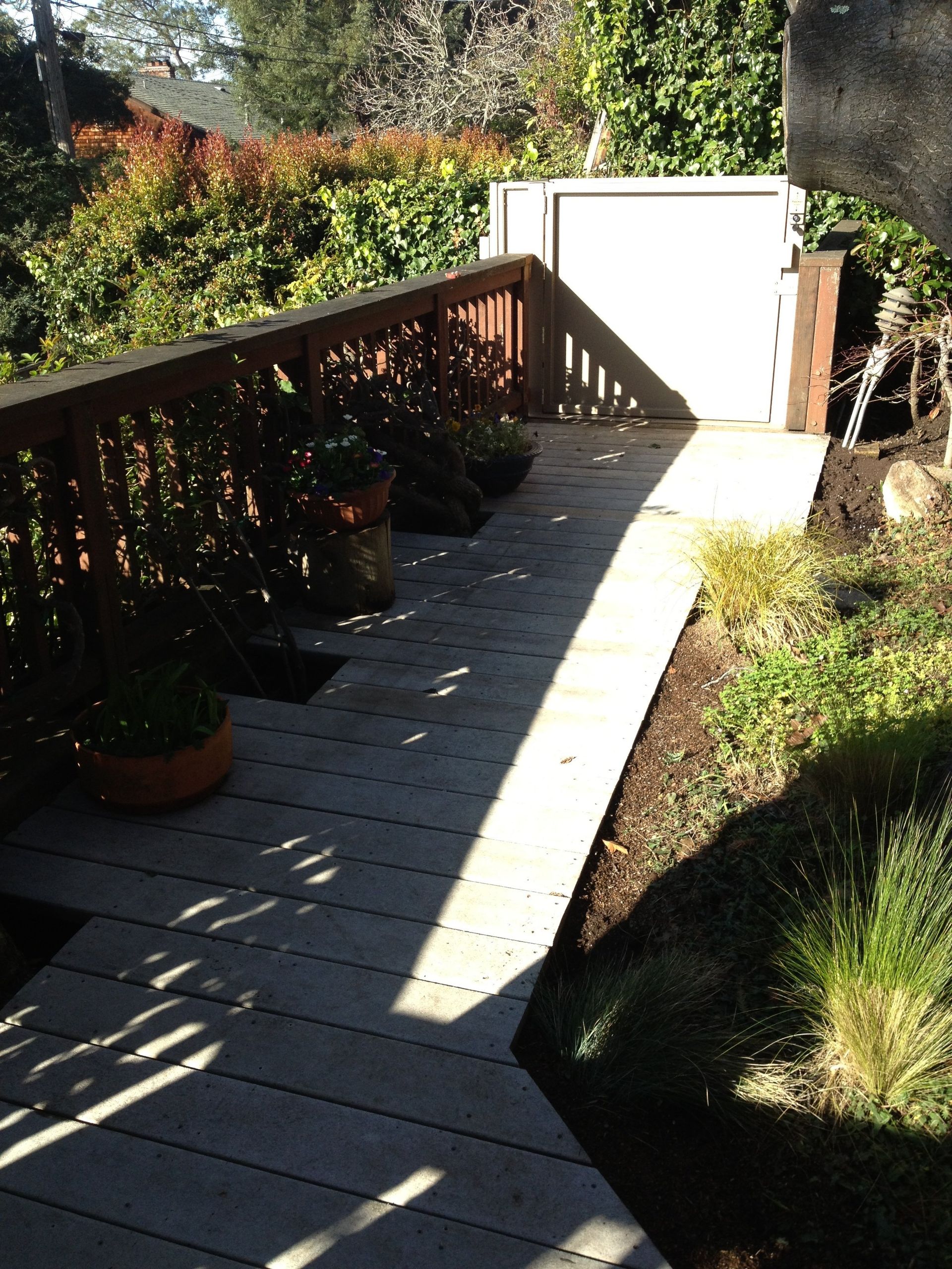 Open wheelchair lift in backyard