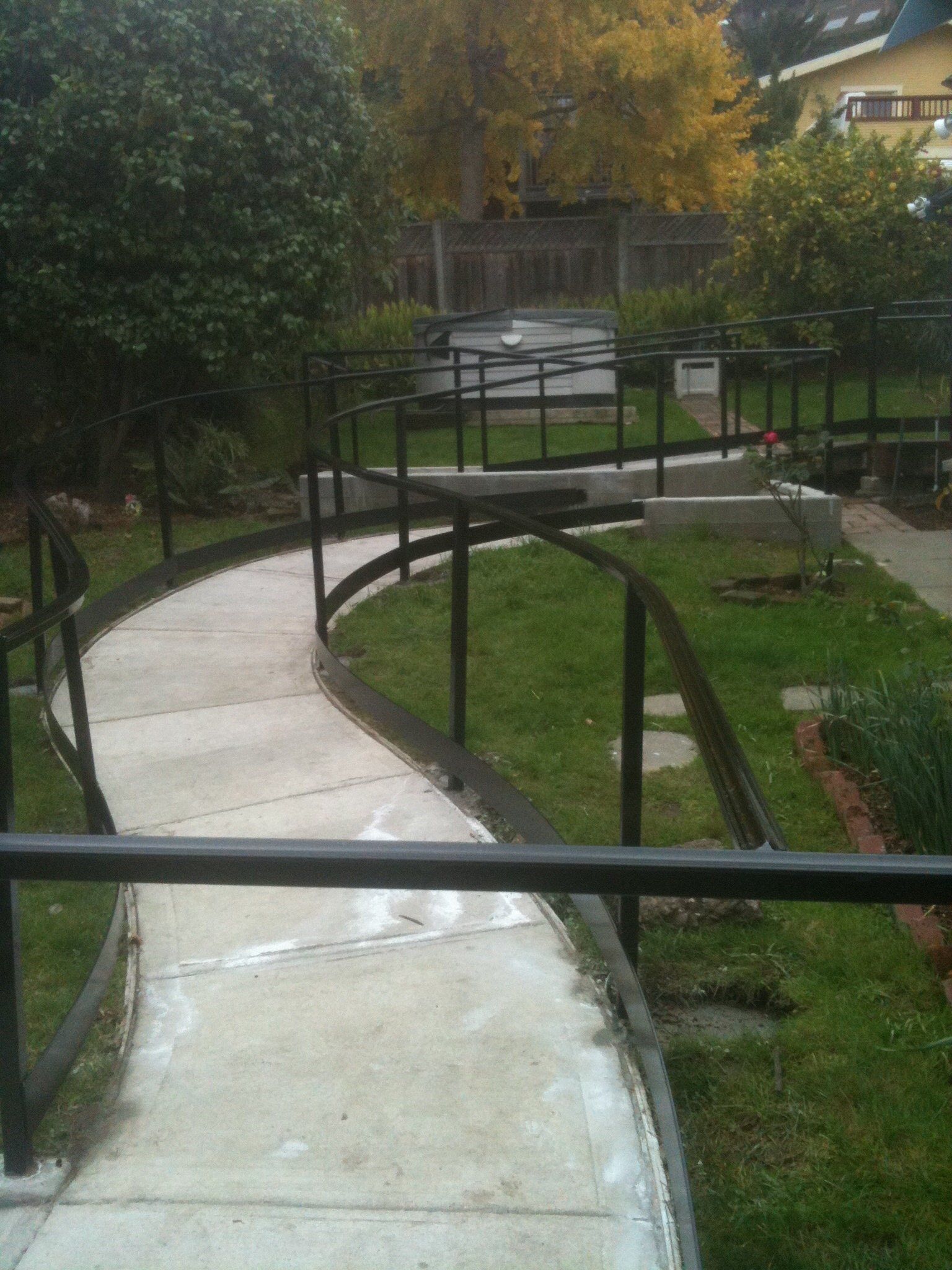 Concrete wheelchair walkway/ramp
