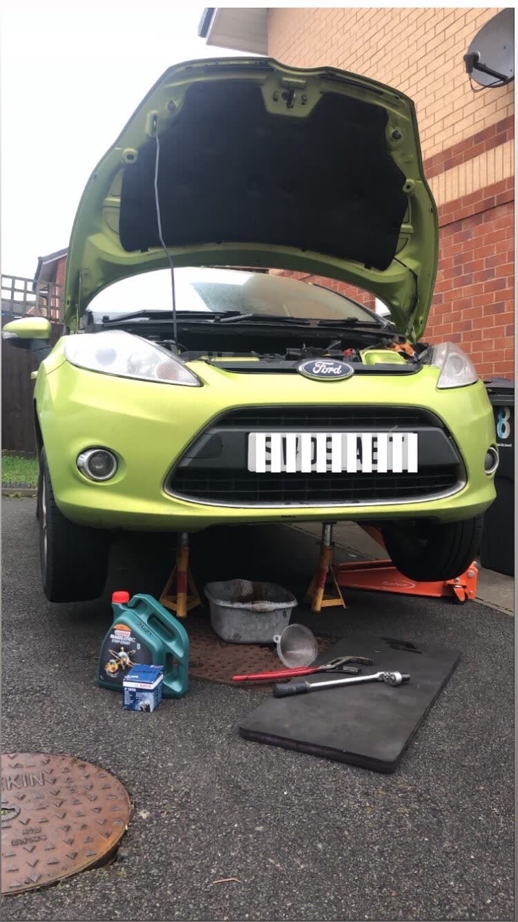 green car bonnet up