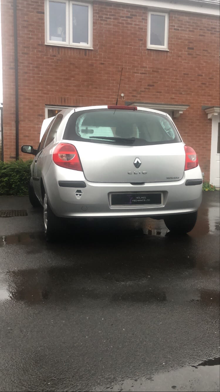 silver car in drive