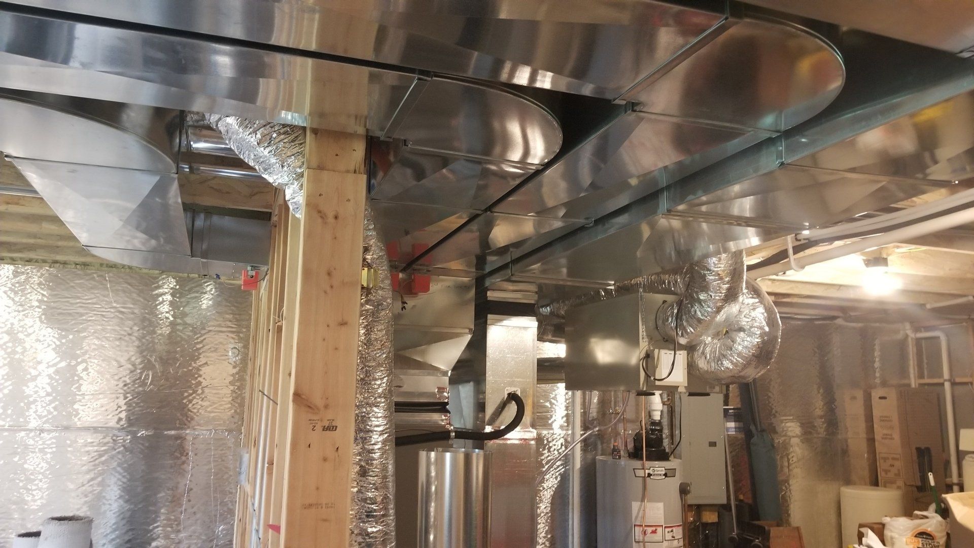 Residential Heating — Technician is Checking Air Conditioner in St. Michael, MN Residential Heating — Technician is Checking Air Conditioner in St. Michael, MN