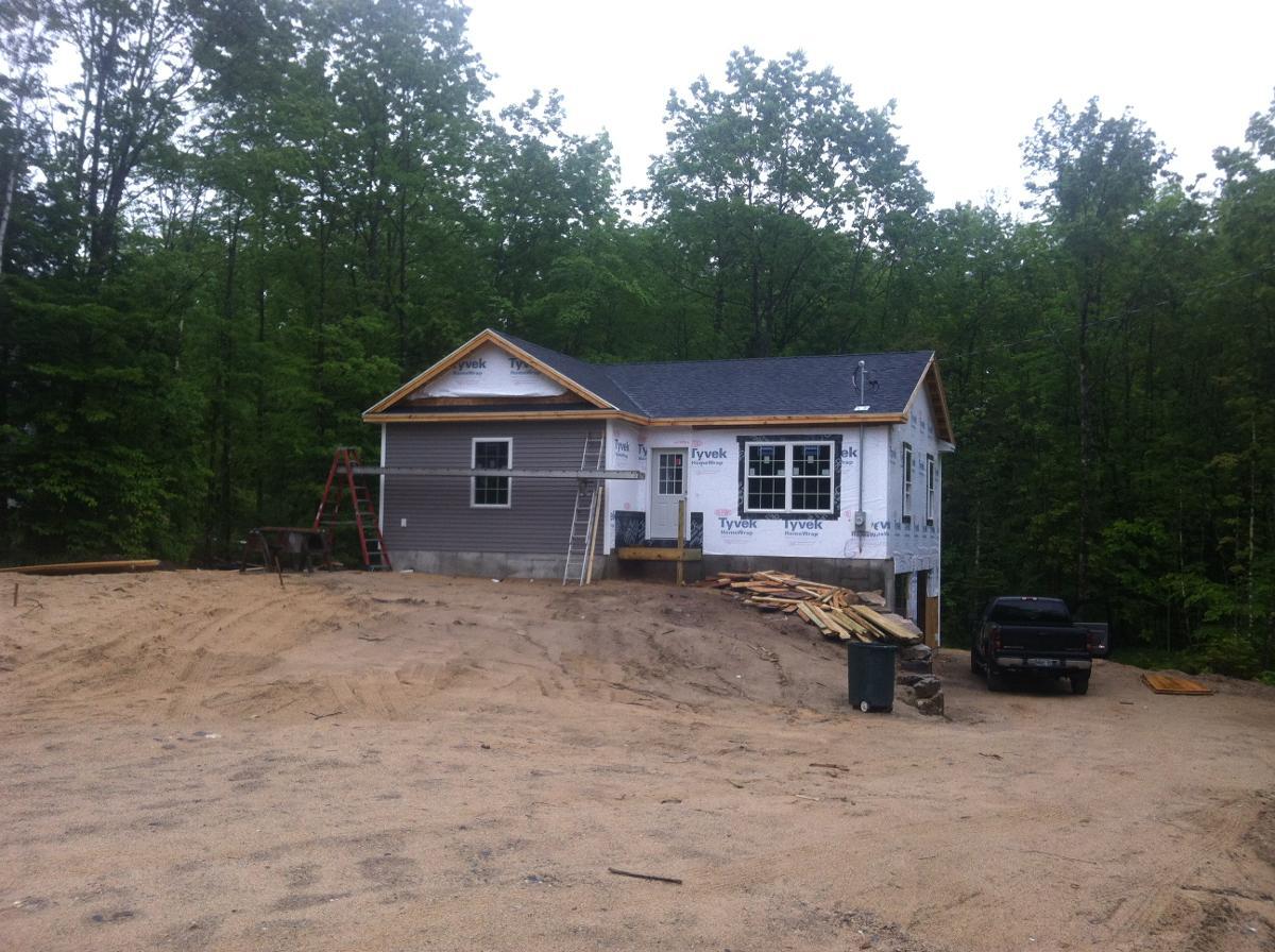 Siding installation in progress on home
