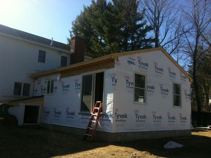 Home expansion in the process of having insulation installed in Windham, ME