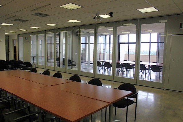 Conference Room with Folding Glass Wall image — Miami, FL — Folding Walls Of Miami Inc