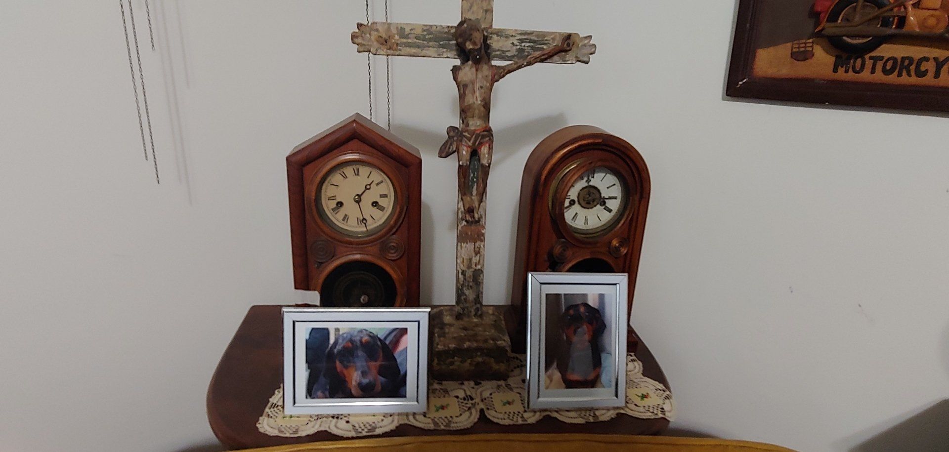 Clocks With Picture Frame And Crucifix In The Middle — Charleston, SC — Captain Mikes Clock Shop