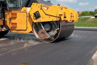 Asphalt Paving Machine - Roads in Alpena, MI Asphalt Paving Machine - Roads in Alpena, MI