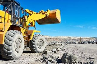 Wheel Loader Excavator at Granite Opencast Mine - Concrete in Alpena, MI Wheel Loader Excavator at Granite Opencast Mine - Concrete in Alpena, MI