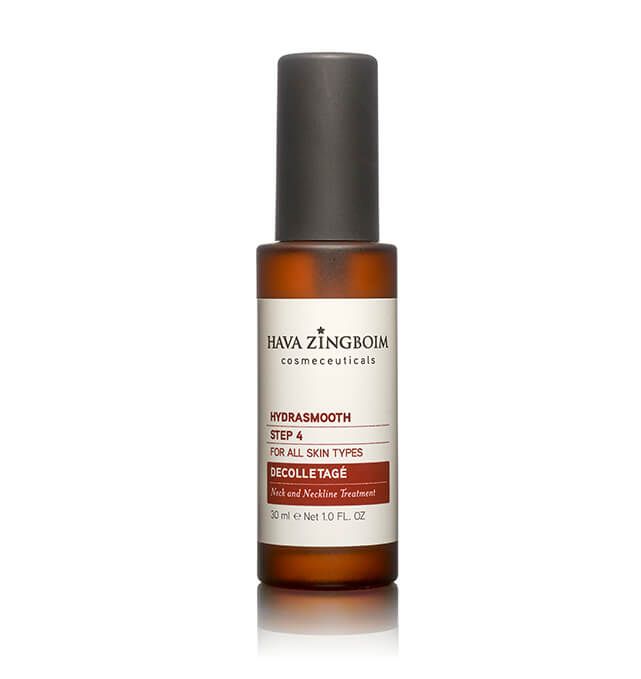 A brown bottle with a white label is sitting on a white surface.