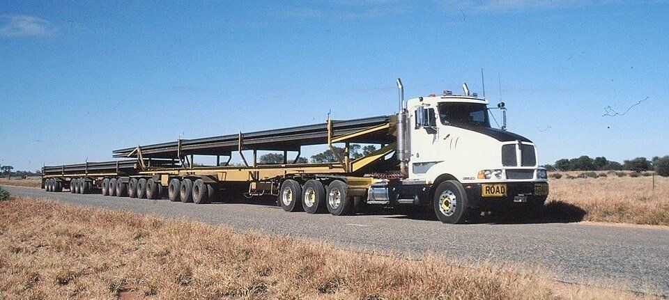 A white semi truck with the number 80 on the side of it- Slingshot Haulage in Katherine, NT