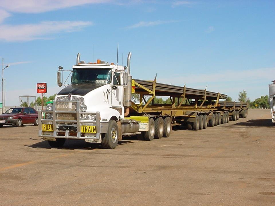 A white truck with a license plate that says tf71l- Slingshot Haulage in Katherine, NT