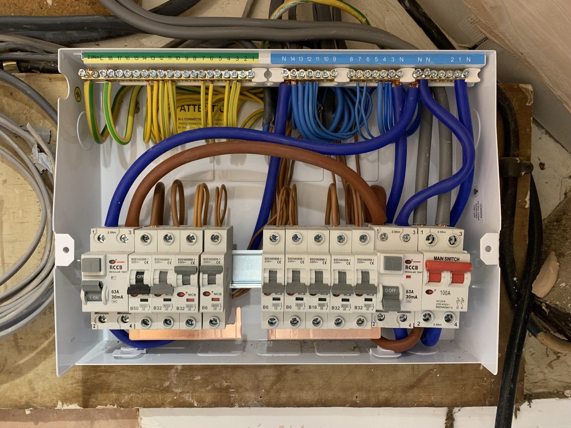 A white box with a bunch of wires in it