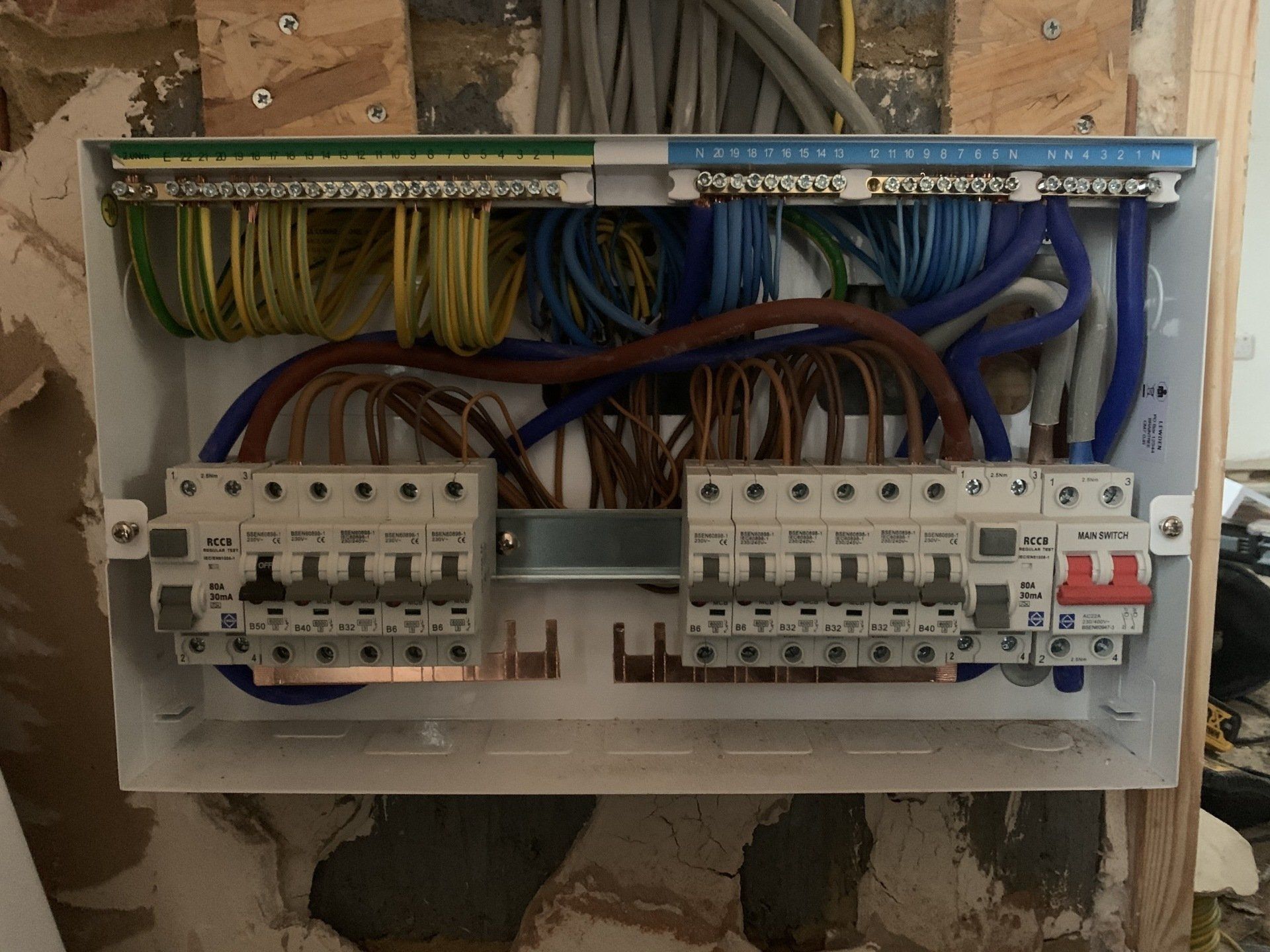 A electrical box with a lot of wires in it