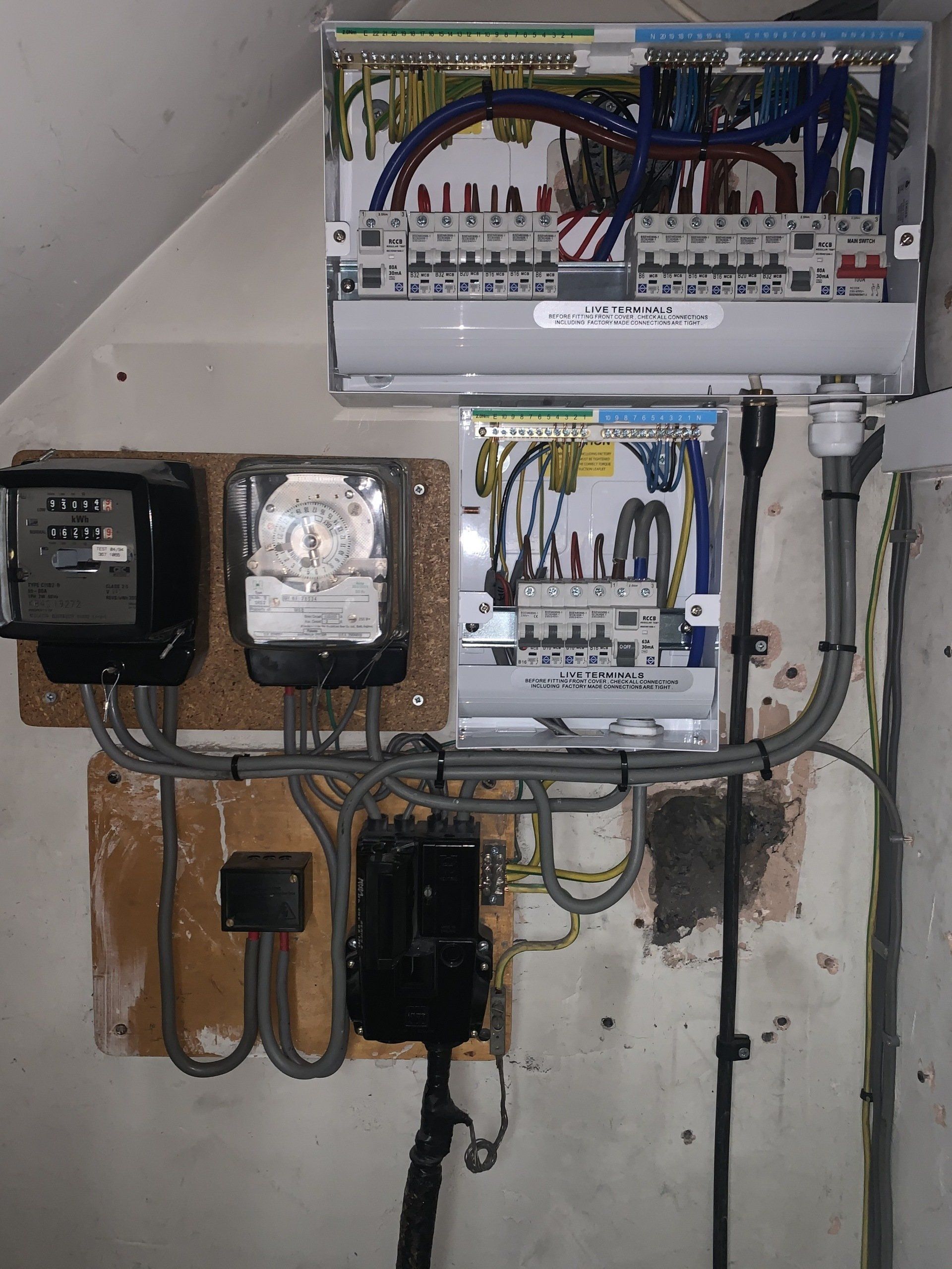 A close up of a electrical box on a wall.