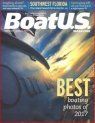 A boat is on the cover of a boating magazine.