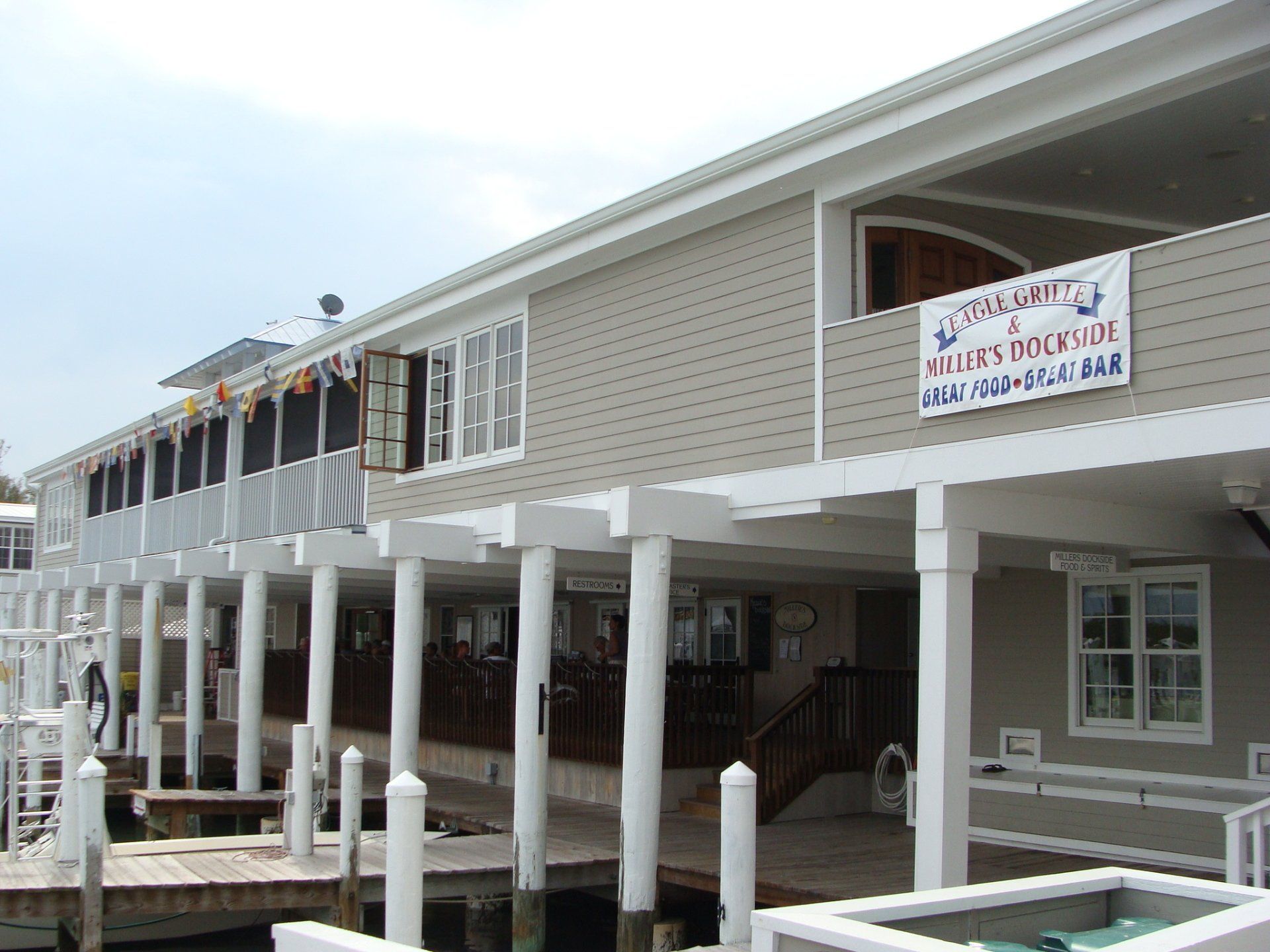 A large building with a sign that says miles dockside
