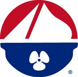 A red white and blue logo with a flower in the middle