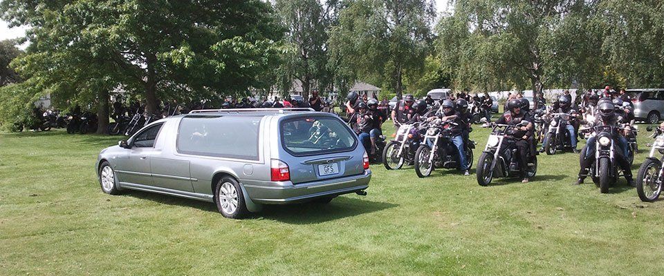 People on bikes are going for funeral