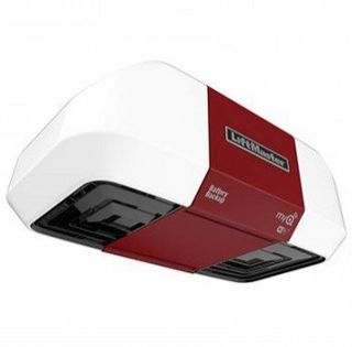 Women pressing wireless garage switch — Garage door programming in Harrisonville, MO Women pressing wireless garage switch — Garage door programming in Harrisonville, MO