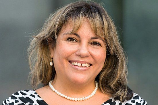Latina woman smiling with tooth gap, Dental Bonding services in Cicero, IL 60804