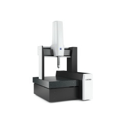 A machine is sitting on top of a table on a white background.