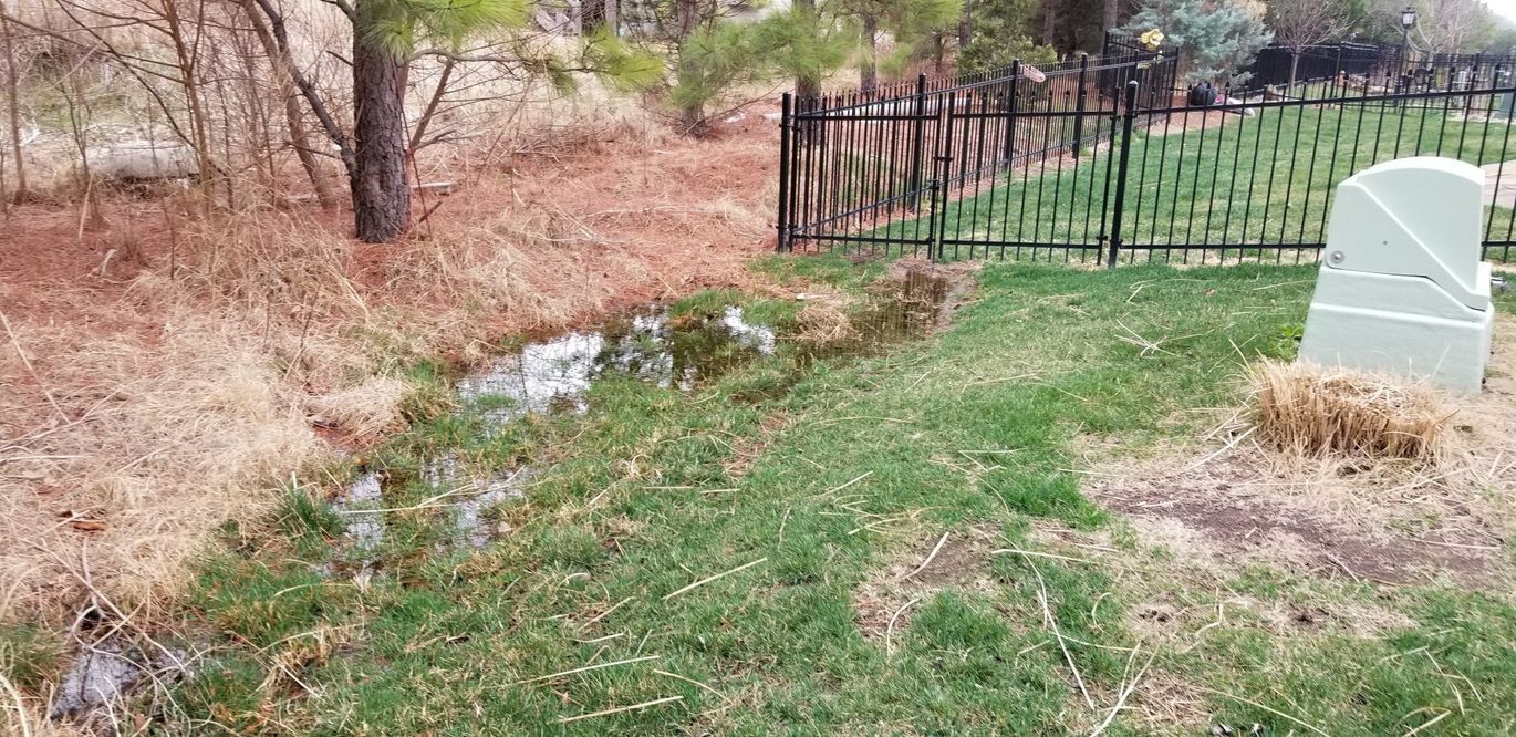 Block Retaining Wall — Land With Long Grasses in Wichita, KS
