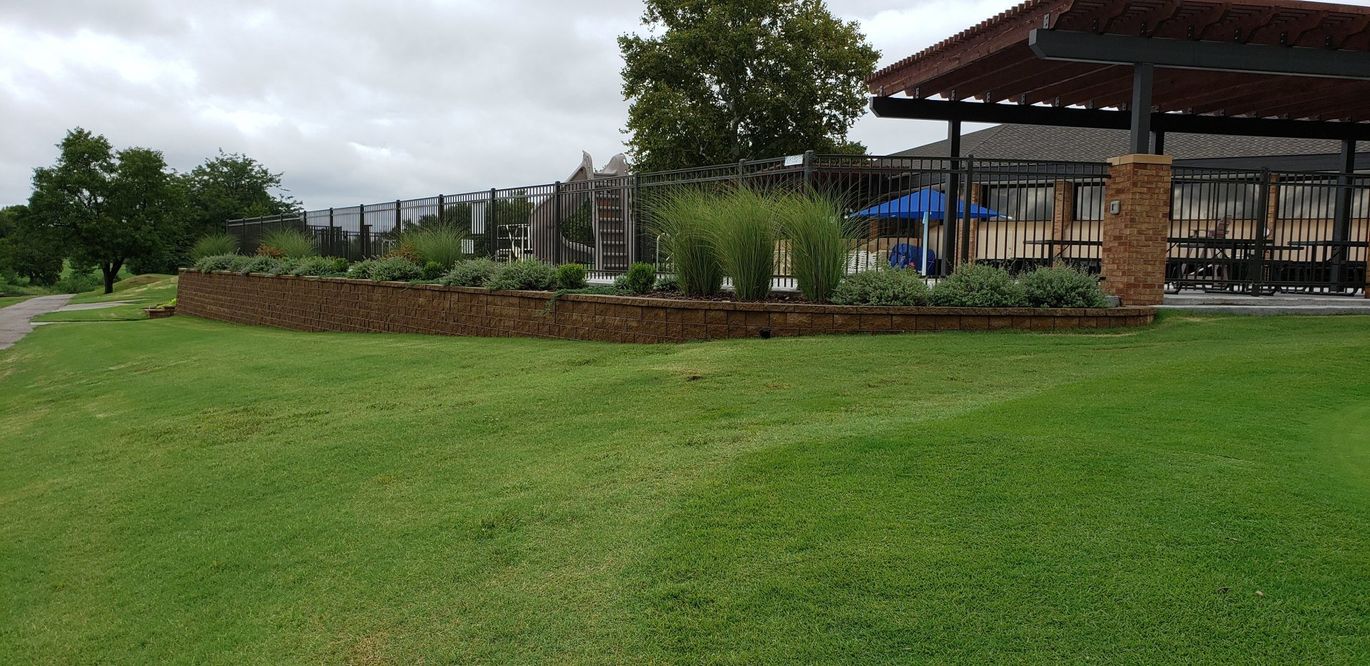 Patios — House With Black Fencing in Wichita, KS